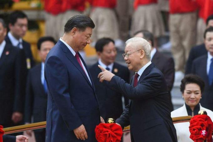 习近平会越共总书记阮富仲 同意积极解决南中国海分歧